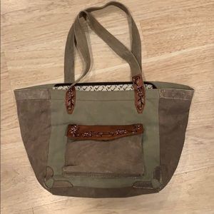 Fabric bag with leather embroidery